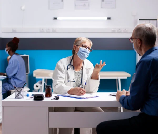 doctor-man-discuss-health-details-1200x1200